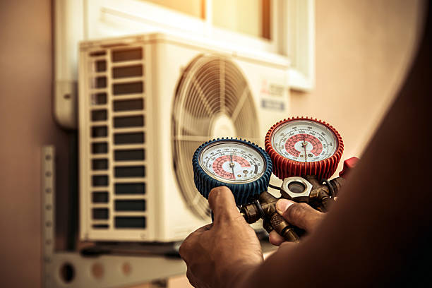 Professional Hvac technician working in Sharon, MA